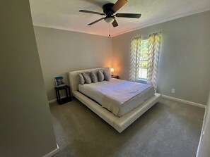 Spare bedroom with queen bed. 