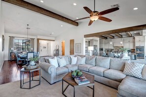 Living Room with Large Sections Seating and Smart TV