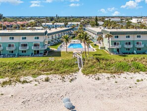 unit is in the building to the left on the corner (top 2 floors) direct ocean front