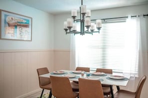 Enjoy a meal together in the dining room. Seating for six with two extra dining chairs available