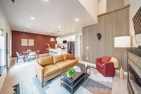 Welcome to Arrowhead! This pristine space is equipped with a leather couch & a cozy fireplace.