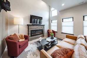 TV w/ full streaming and a gas fireplace for a cozy evening.
