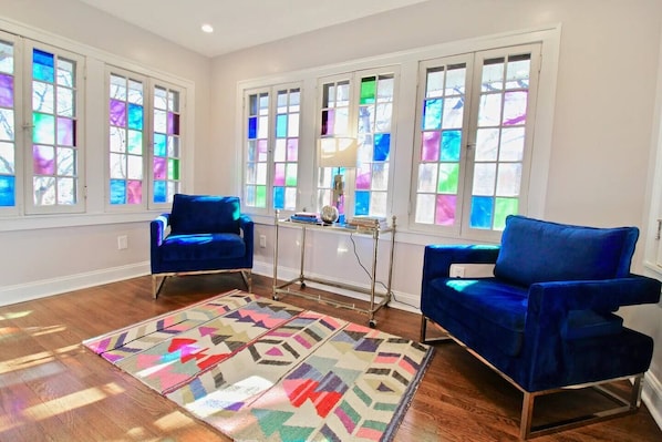 Second floor sunporch with stained glass
