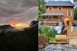 Sunset with amazing view front view of cabin and Barrel Sauna with Hot Tub.