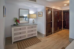 Bedroom area, with dresser and closet storage