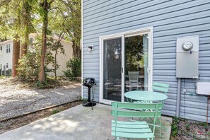 {PRIVATE PATIO} Step into a tranquil outdoor haven on the patio with BBQ grill.