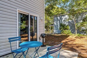 {PRIVATE PATIO} Step into a tranquil outdoor haven on the patio with BBQ grill.