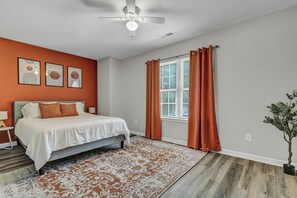 {MASTER BEDROOM}Indulge in comfort with queen bed, smart TV and ensuite bathroom