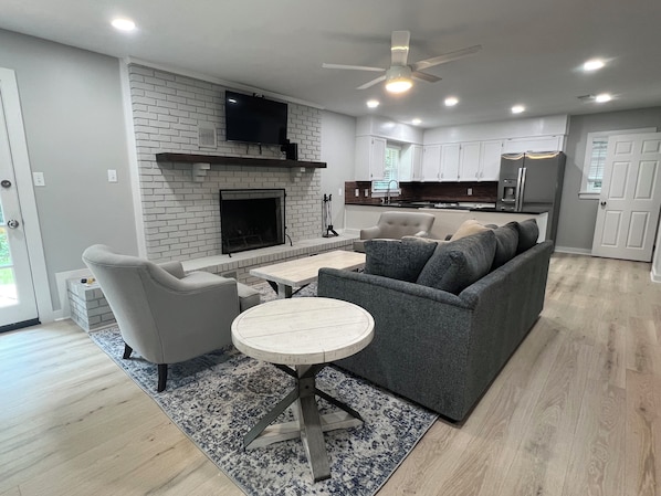 Open concept living room and kitchen. Dining room adjacent that seats up to 7. 