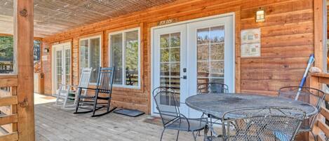 Patio table for 4 guests and rocking chairs for those summer nights