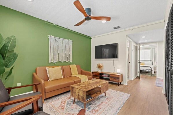 Living Room with Smart TV and Futon couch