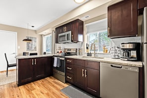 Create unforgettable dining experiences in your well-furnished kitchen.