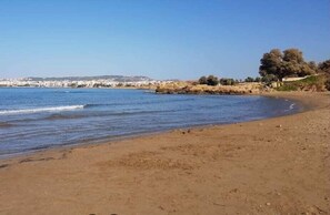 Enjoy the golden sand at Hrisi Akti beach (3km)