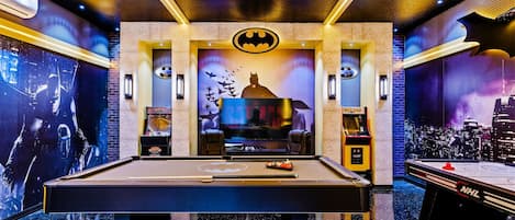 Unleash your inner hero in the Batman themed game room