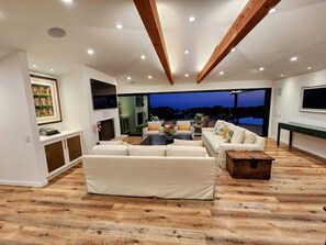 Open floorplan connects the living room with the outdoor covered patio