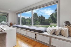 The house features a TON of natural light, comfy sitting areas and sleeps 16!