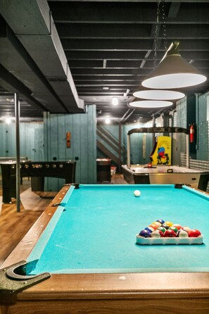Get competitive with a fun game of pool or enjoy a nostalgic arcade game of Pac-Man—perfect for friendly matches and endless entertainment!
