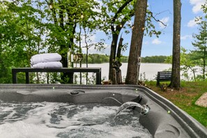 Enjoy a soak in the hot tub with nature right next to you—perfect for relaxing and soaking in the serene surroundings