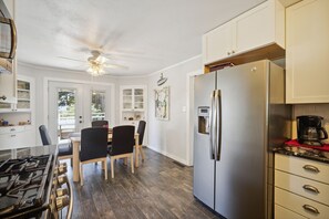 Indoors, Refrigerator, Ceiling Fan, Kitchen, Dining Table