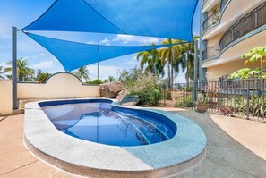 Spend warm summer days lazing by the communal pool. 