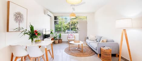  A simple, yet elegant dining table setup waits in the dining area.
