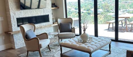 Living Room with Bifold Doors out to Private Patio