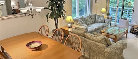 Classy wood table, soft couch – the perfect spot to sit back, relax, and unwind