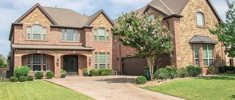 Great curb appeal and the only house with stamped concrete driveway in the neighborhood