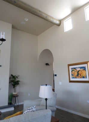 Yellow Horses painting in living room.
