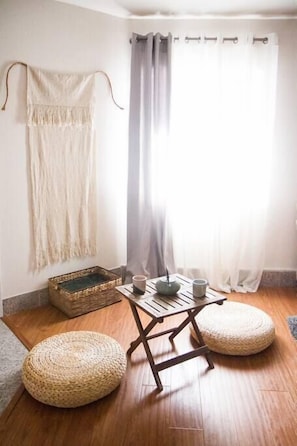 A cozy Japanese tea table has been set up for your enjoyment. This unique and intimate setting can also double as a romantic table for two in the evening. Wine glasses & champagne flutes are available to add that extra special touch to your stay.