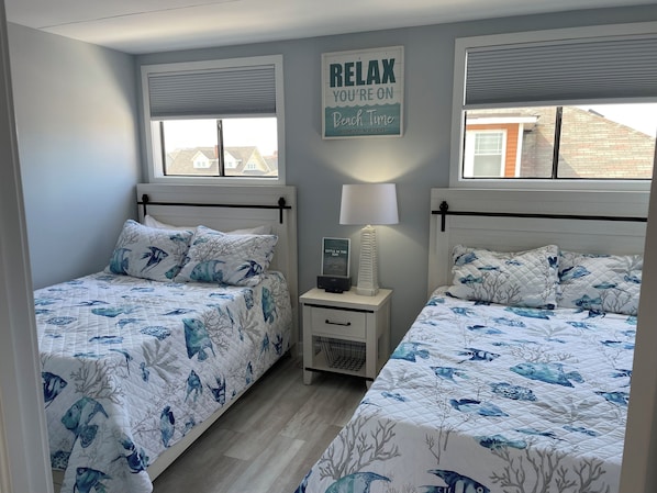 Bedroom with 2 Full beds.