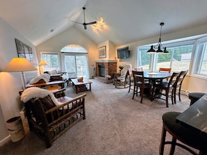 This retreat boasts an open-concept layout with a tastefully updated kitchen, dining, and living area