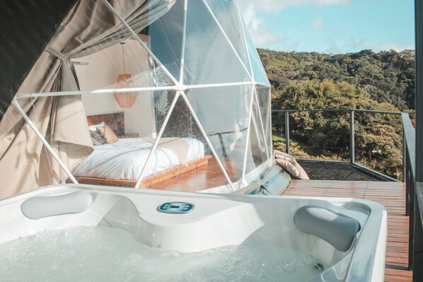 Hot tub, loft net, king size bed, and breathtaking views. What else do you need?