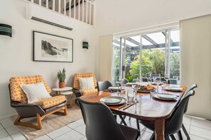Bask in the light and bright living and dining area.