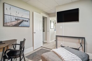 The living room is equipped with smart tv and wifi to stay connected.