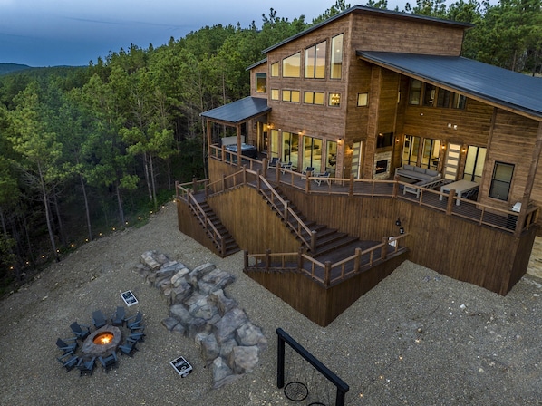 Rear view of cabin amongst the trees 