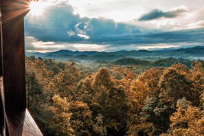 Incredible views from double, wraparound decks and views of the iconic Mt. Leconte await you at The Heartbreaker! An easy drive just moments from the parkway.