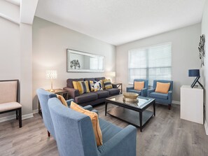 Gorgeous Downstairs Living Area with Comfortable Seating and Dining Area