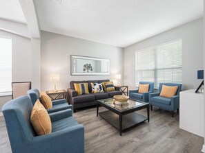 Gorgeous Downstairs Living Area with Comfortable Seating and Dining Area