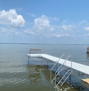 Sit on the dock or use the ladder to get in the water and swim