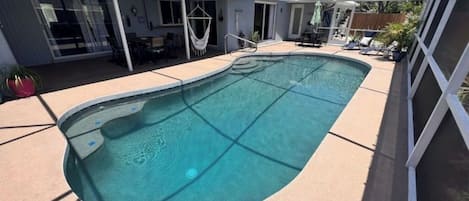 covered sitting area poolside
