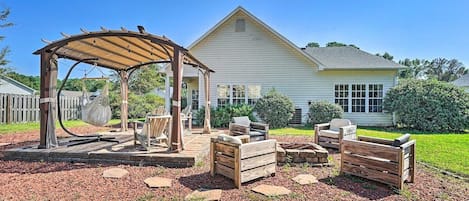 Beautiful backyard for relaxing, reading, playing yard games, fire pit and grill out