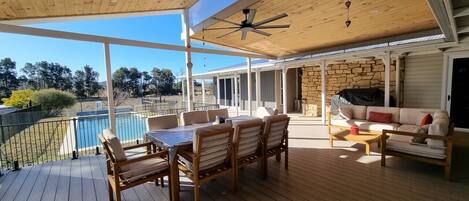 The outdoor area has a BBQ perfect for summer nights. Enjoy dining outside under cover with a breezy ceiling fan. 
