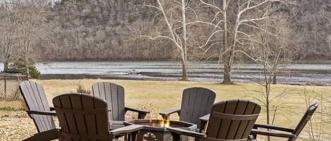 Firepit with lake views. Firewood is provided. 