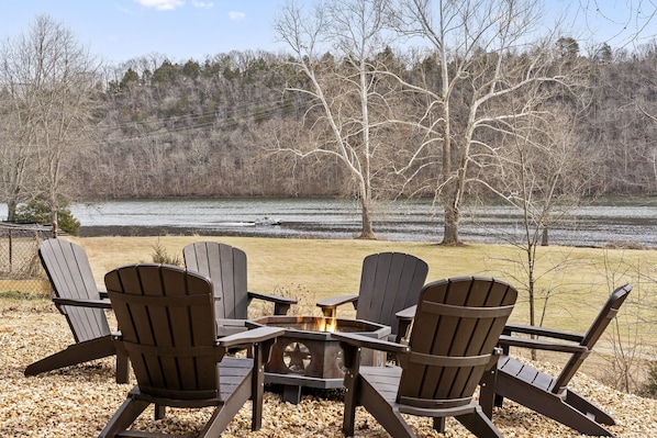 Firepit with lake views. Firewood is provided.