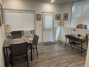 Private entrance leads to dining and study areas. 