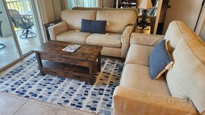 Living room. Opens to the lanai.