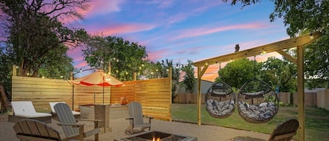 Backyard Retreat with Cowboy Pool, Fire Pit and a large back deck with Dining!