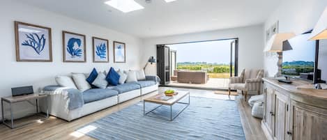Home Reach: Sitting room with beautiful views of the river and sea beyond
