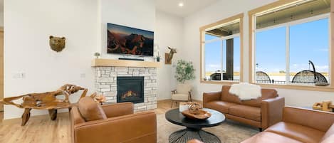 Living Room with Smart TV, Fireplace and Lake Views | Warm and Inviting!